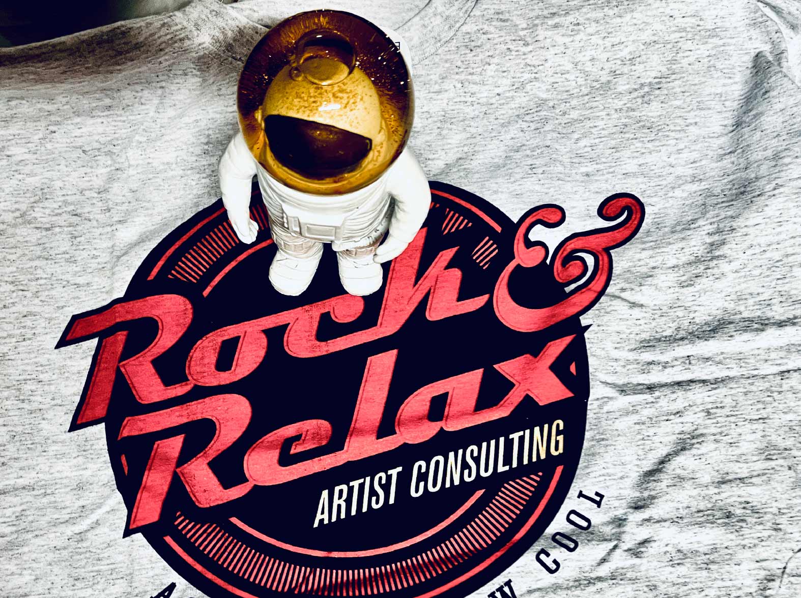 Bil dmit Rock and Relax Logo un euiem Astronauten